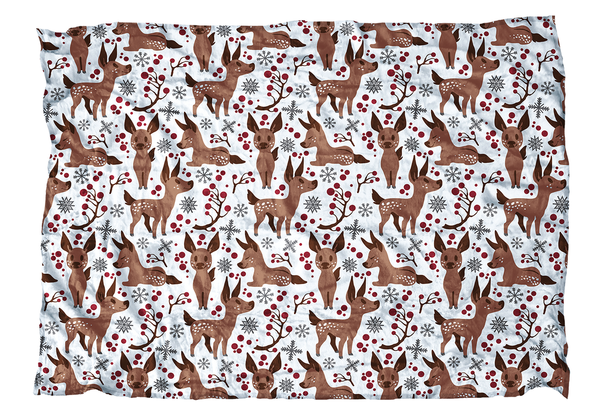These fawns are ready for their first winter! This baby deer blanket with red accents is sweet addition to your winter decor.
