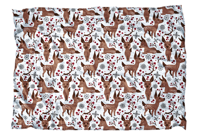 These fawns are ready for their first winter! This baby deer blanket with red accents is sweet addition to your winter decor.