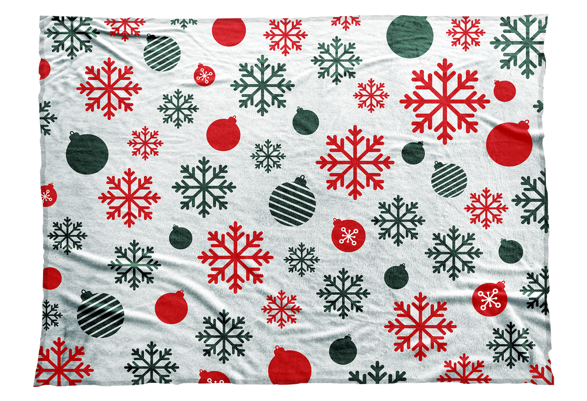 Red and green snowflakes and Christmas ball ornaments decorate this seasonal blanket.